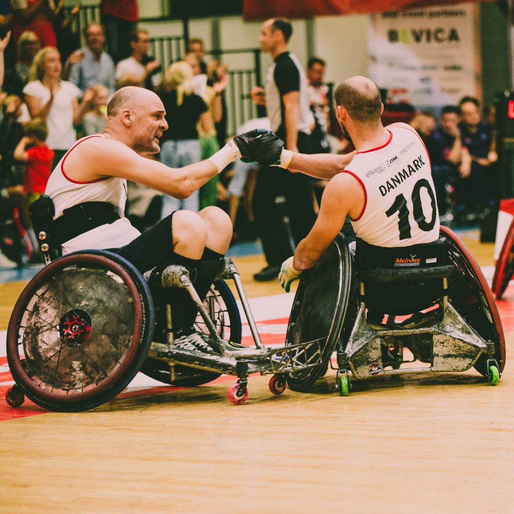 Wheelchair rugby players celebrating